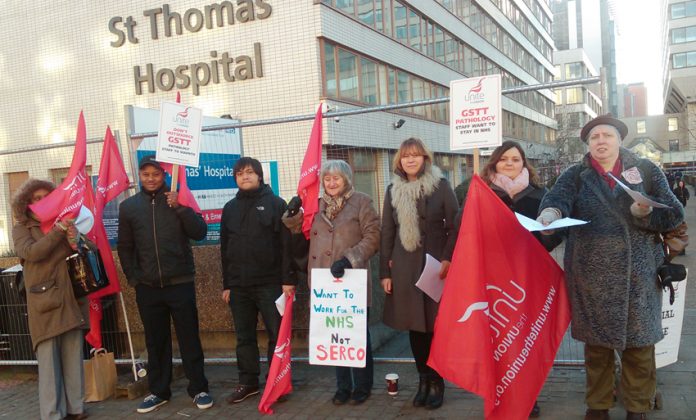 Pathology strikers deliver their message from the picket line at St Thomas’ Hospital on Westminster Bridge