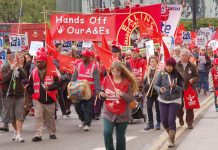 Health workers marching through London in May 2013 – protesting against plans to cut and close A&Es