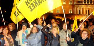 Sacked schools’ guards, part of the 10,000-strong workers’ protest outside the Greek parliament that defied the European Central Bank and shouted ‘We will not be blackmailed’