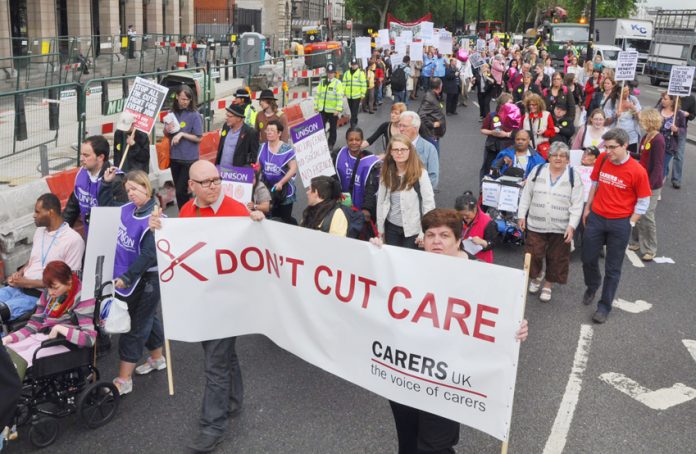 Disabled and care workers demonstrate against cuts