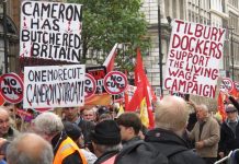 Trade unionists made their mind up about the role that Cameron and the Tory Party were playing a long time ago – picture shows placards from the October 2012 TUC demonstration against austerity in London