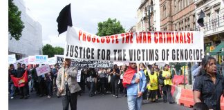 Marchers in London demanding prosecution of the war criminals in Sri Lanka responsible for the deaths of over 70,000 Tamils in May 2009