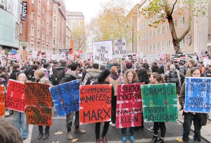 Students on a demonstration in central London fighting against fees demonstrate their defence of the arts
