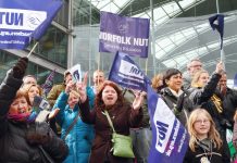 Teachers rally in Norwich during the strike in March last year – they are opposing Free Schools