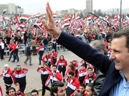 Syrian president ASSAD waves to supporters during a recent rally