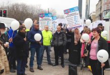 Limehouse surgery practice nurse JUNE GRAY addressing yesterday’s protest against cuts to east London GP surgeries