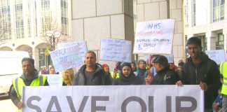 ‘Mayor come down! Don’t cut our service!’ shouted families fighting against cuts to the disability service outside Tower Hamlets Town Hall yesterday lunchtime