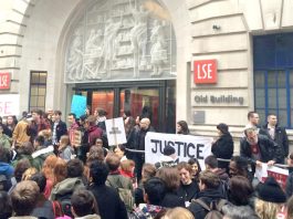 Students demonstrate outside the London School of Economics where they have been occupying since March 17