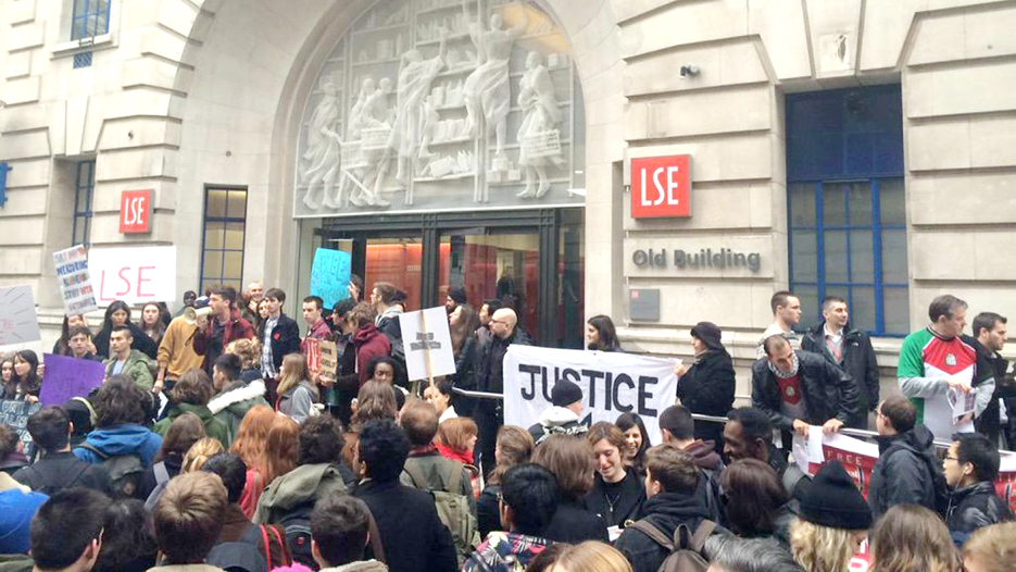 Students demonstrate outside the London School of Economics where they have been occupying since March 17