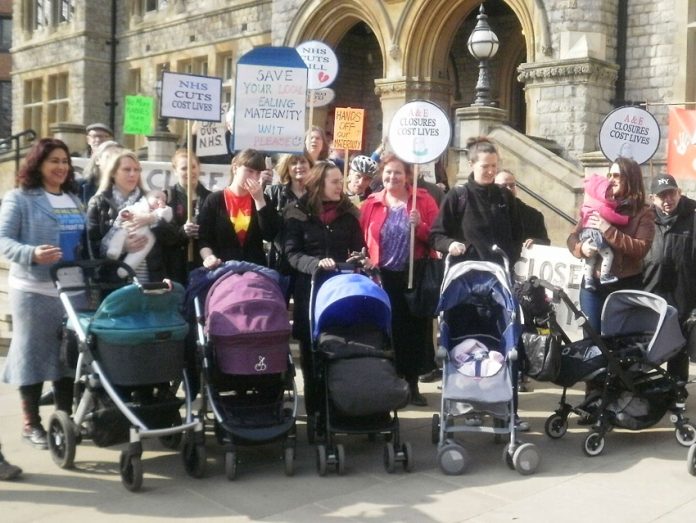 Ealing mothers and their babies lobbying the Clinical Commissioning Group demanding that their hospital’s Maternity Department is kept open