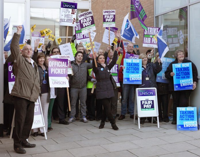 NHS workers in Norwich picket during the recent strike action – they are determined to prevent the privatisation of the NHS