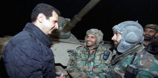 President Assad visits Syrian troops