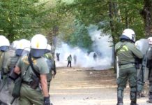 Riot police attacking villagers with tear gas in Skouries, northern Greece. Photo left.gr