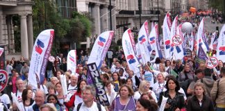 RCN nurses marching on a TUC demonstration last October – there are now fewer nurses than there were in 2010