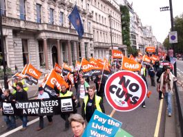 The Trade Unions Slam Tory Plans To Ban Strike Action And Sell Off Council Homes GMB members on a TUC demonstration against Tory cuts and demanding a decent pay rise
