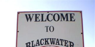 Logo outside the Blackwater HQ with bloody hand stains on it