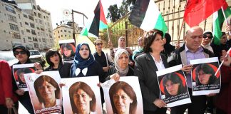 Palestinian demonstrators call to free Palestinain leader Khalida Jarrar