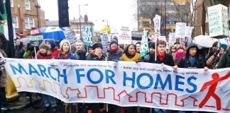 Workers on a defend council housing march to London’s City Hall in January fighting against government cuts to housing and mass evictions