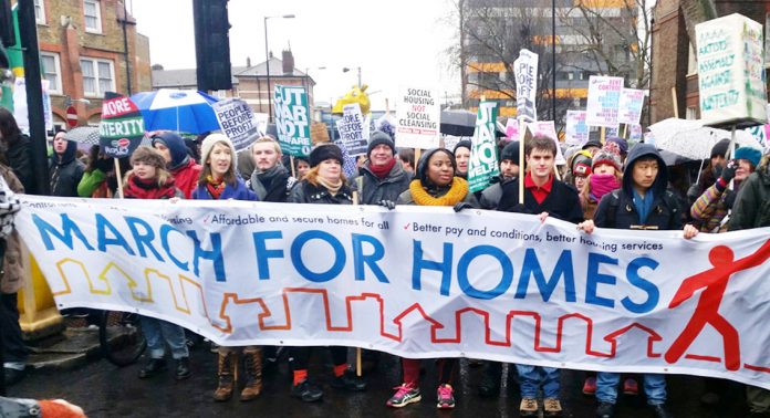 Workers on a defend council housing march to London’s City Hall in January fighting against government cuts to housing and mass evictions