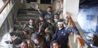 Syrian troops besieged in the hospital at Jisr al-Shugour