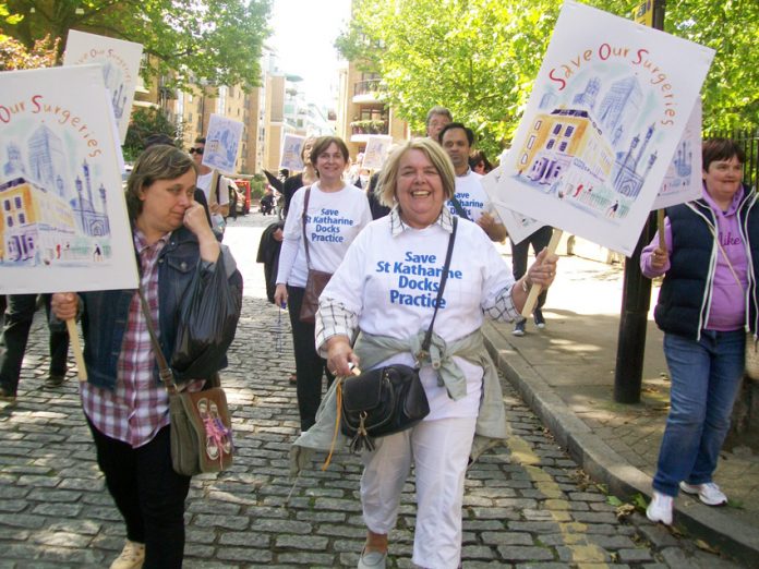 Patients, GPs and staff marching through Tower Hamlets to defend 21 east London GP surgeries threatened with closure
