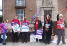 Pickets outside East Finchley library yesterday during the first day of their two-day strike action against cuts and privatisation