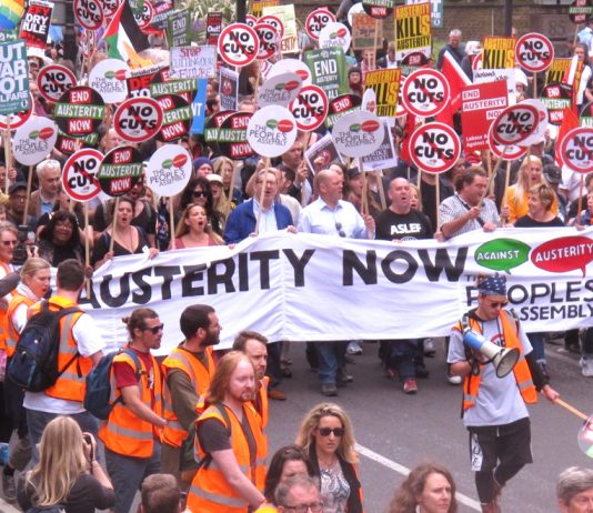 The lead banner ‘End Austerity Now’ is carried by trade union leaders, including Unite’s Len McCluskey (centre)