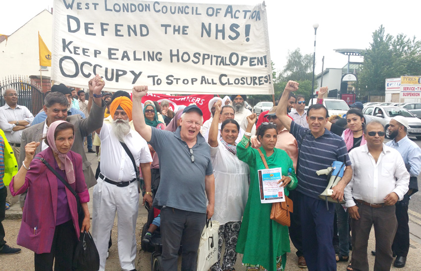 Marchers show their enthusiasm and determination before the march started in Southall yesterday