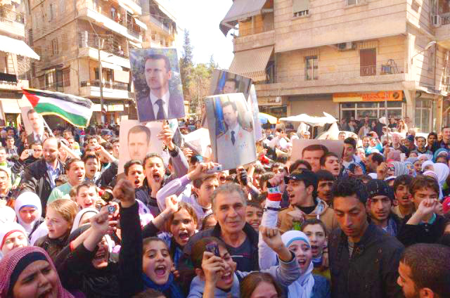 Syrians demonstrate in support of President Assad in Midan