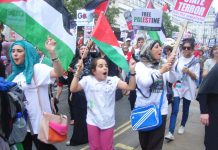 Young people marching to the Israeli Embassy in London to denounce Israeli war crimes in Gaza