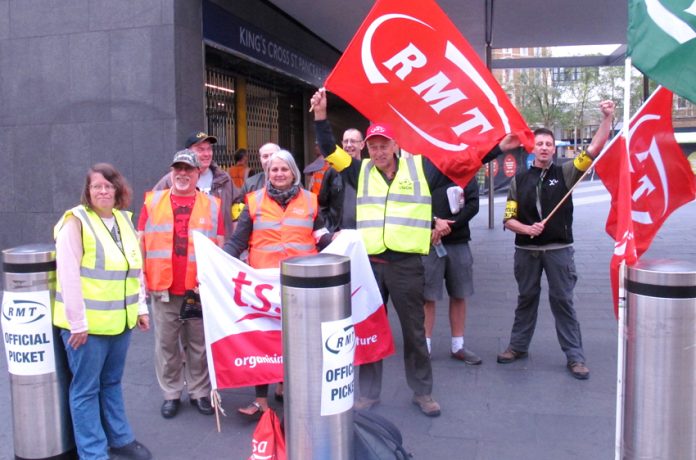 Above: Pickets at King’s Cross station were in a determined mood with one picket stating ‘we need a general strike against austerity’.