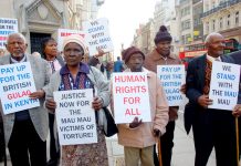 Kenyan Mau Mau veterans picket the law courts in the Strand as a successful legal case is brought against the UK government