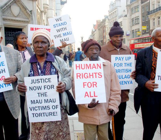 Kenyan Mau Mau veterans picket the law courts in the Strand as a successful legal case is brought against the UK government
