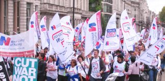 RCN members marching on a TUC demonstration – they are demanding that the NHS is properly financed and thousands of new nurses are brought in to the NHS and trained