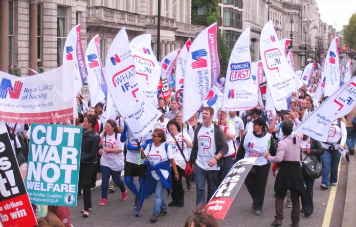 RCN members marching on a TUC demonstration – they are demanding that the NHS is properly financed and thousands of new nurses are brought in to the NHS and trained