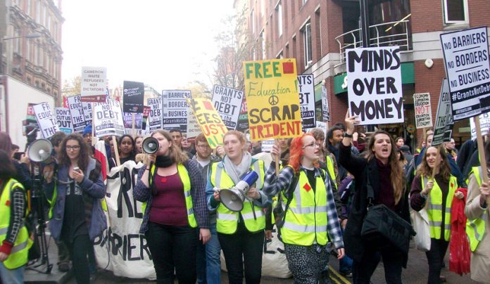 Marchers at the front of Wednesday’s 10,000-strong demonstration against tuition fees demanding the restoration of student grants