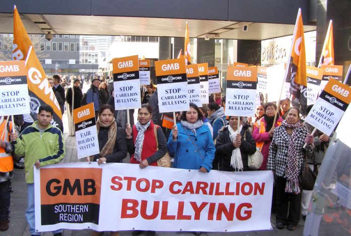 Swindon Hospital Carillion workers demonstrate outside the company’s HQ in London against the company’s work practices
