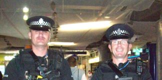 Heavily armed police with sub-automatic MP4 weapons at Liverpool St station in central London