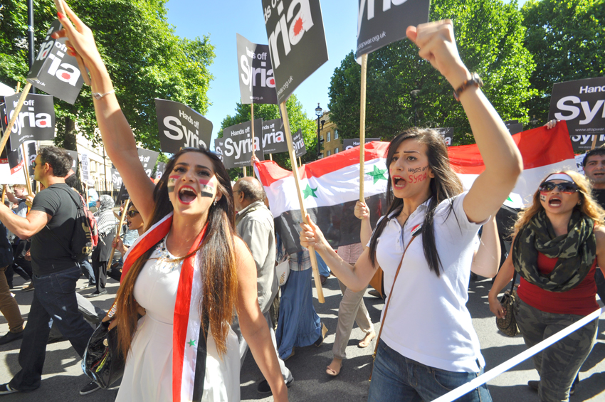 Syrian students on the mass march in central London against the UK bombing of Syria – Cameron wants another vote in parliament