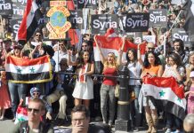 Syrians in London show their support for President Assad