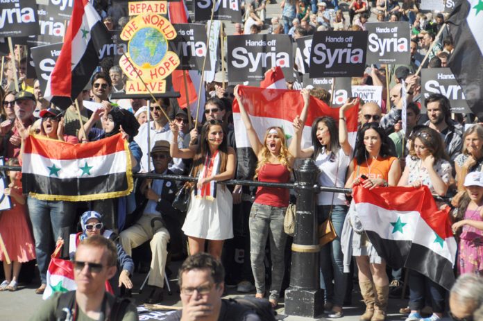 Syrians in London show their support for President Assad