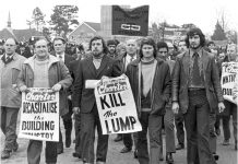 DES WARREN (front second from right) with RICKY TOMLINSON  (next to him holding poster) – both men were jailed as a result of the frame-up trial