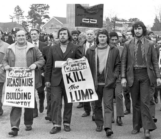 DES WARREN (front second from right) with RICKY TOMLINSON  (next to him holding poster) – both men were jailed as a result of the frame-up trial