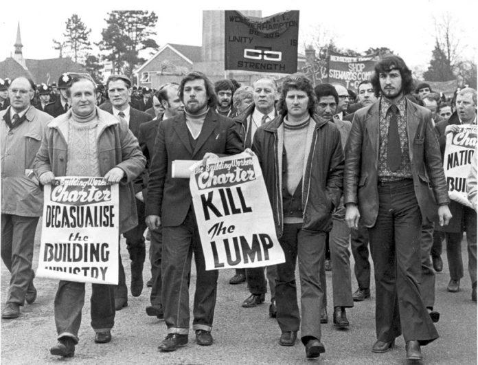 DES WARREN (front second from right) with RICKY TOMLINSON  (next to him holding poster) – both men were jailed as a result of the frame-up trial