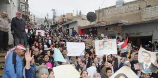 Syrian youth show their support for President Assad