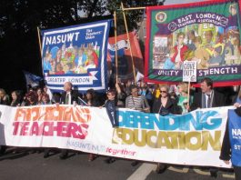NASUWT and NUT banners leading a march in London in defence of education