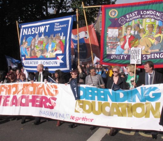 NASUWT and NUT banners leading a march in London in defence of education