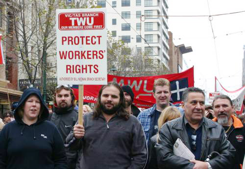 TWU members marching against government attacks – the union is demanding $1 million is returned to it