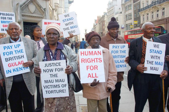 Mau Mau detainees outside London’s High Court recently won massive compensation for British army atrocities committed against them