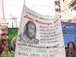 The banner of Jimmy Mubenga a 46-year-old Angolan who died after being forcibly restrained by G4S guards as he was being deported on a flight to Angola in October 2010